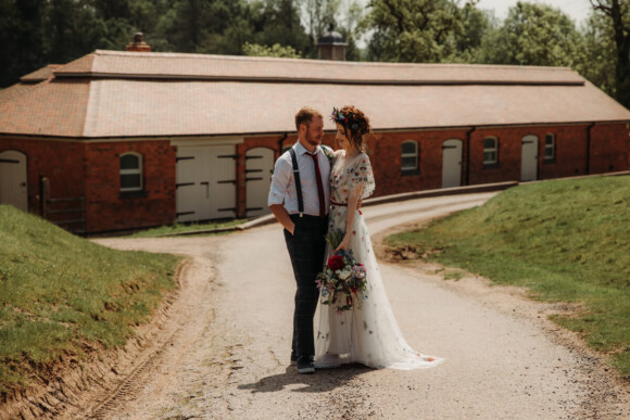 The Hall Barns Prestwold wedding venue with bride and groom