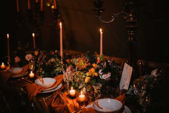 Autumn forest wedding tablescape, seeded paper place names and table number