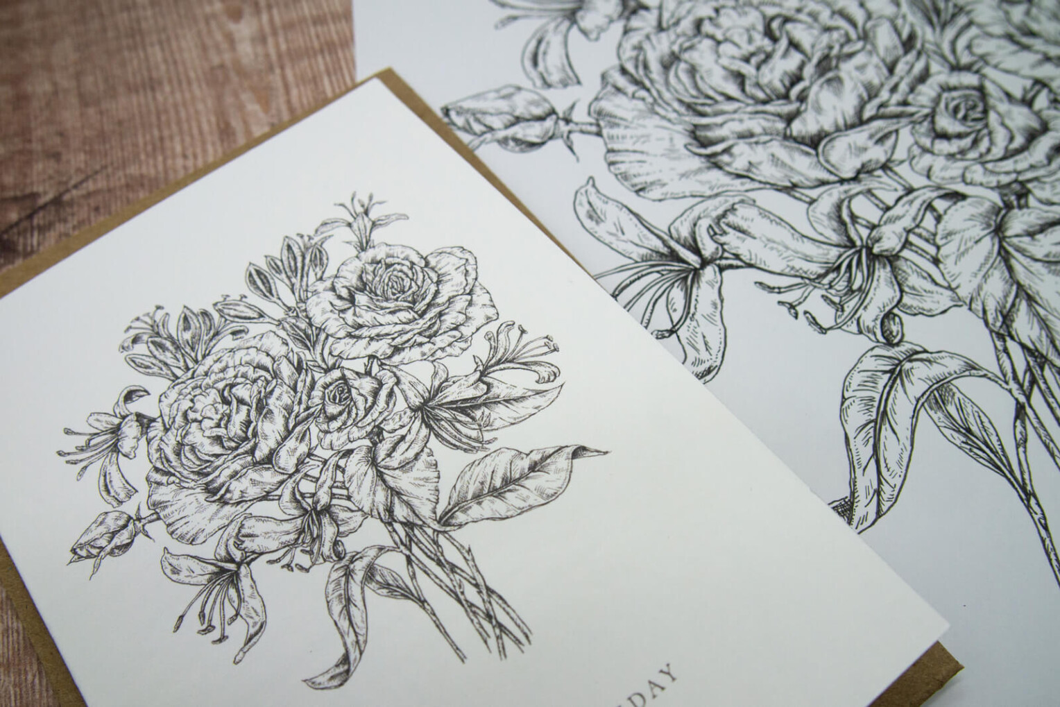 Fine line botanical illustration of rose and honeysuckle, June birth flowers, hand drawn ink artwork by Ellie and Liv with birth flower card